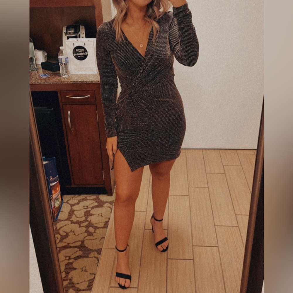 Black, gold, and silver sparkly mini dress